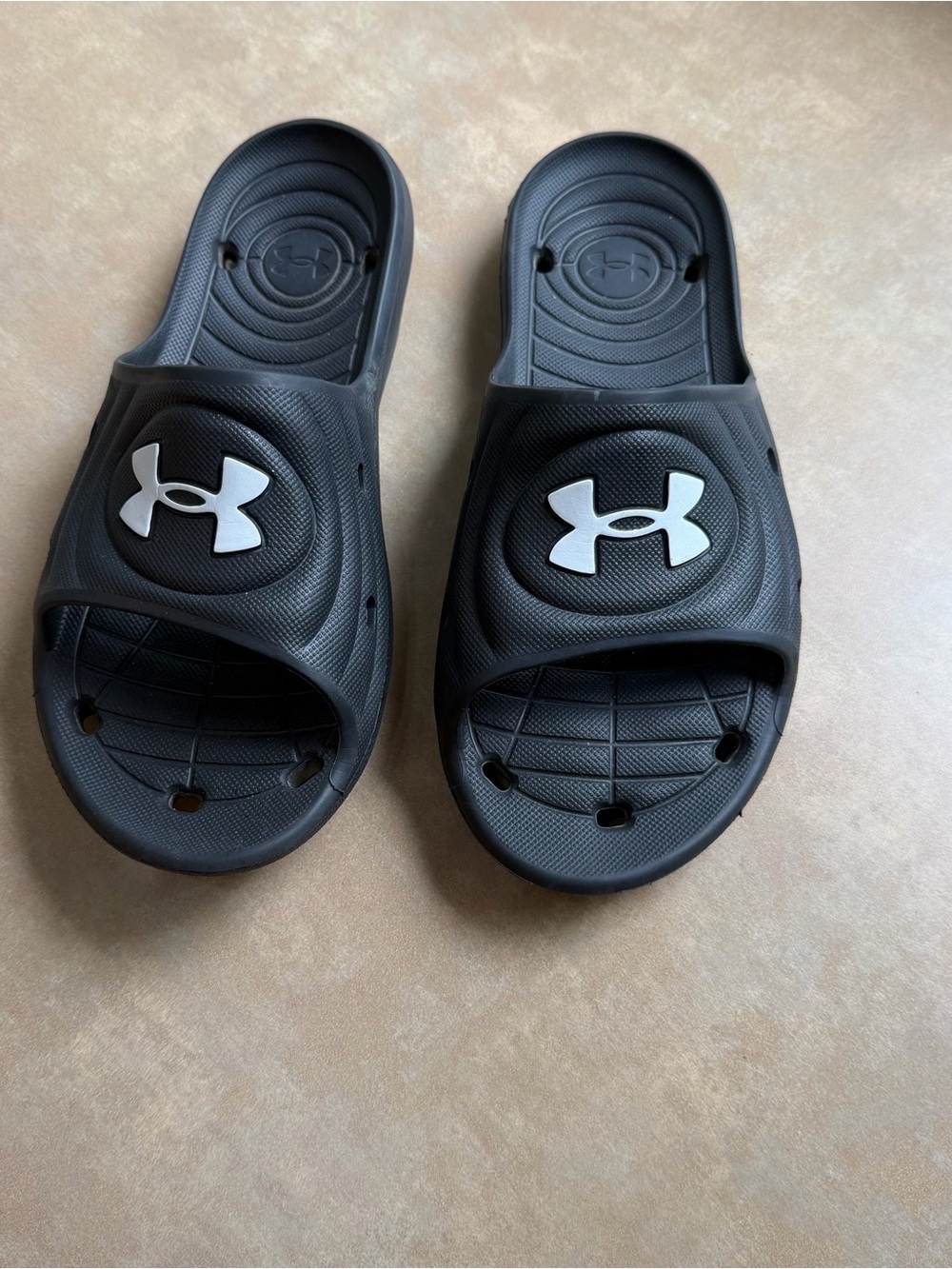 Under Armour Black Slides with White UA Emblem